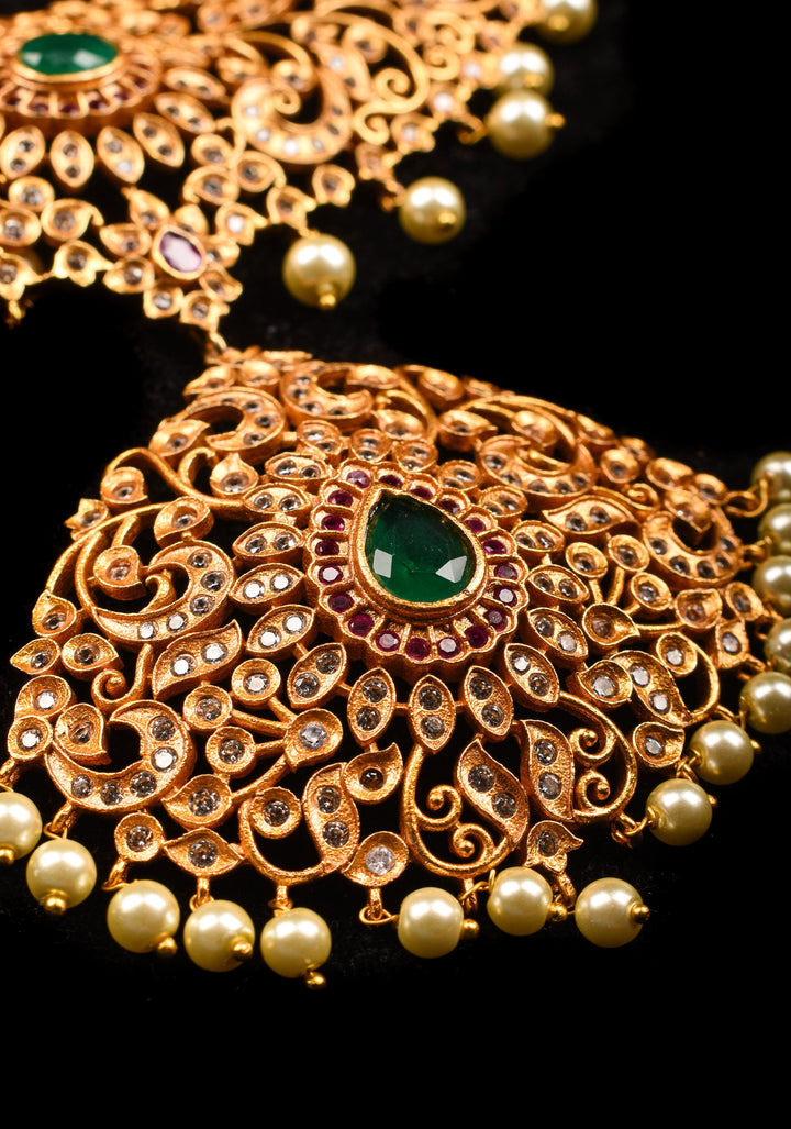 Timeless Elegance: Intricate Gold-Finish Long Haram Set with Gemstones and Pearls