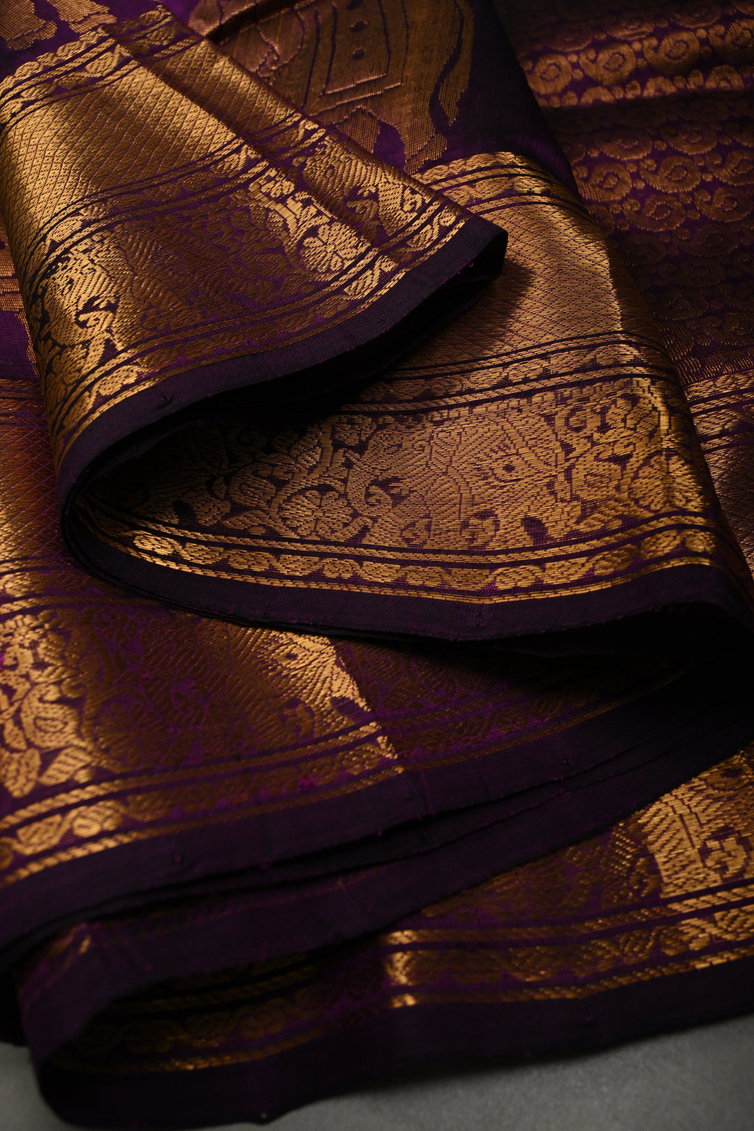 Eggplant Purple Kanchi Silk Cotton Handloom Saree with Zari Checks and Distinct Elephant Motifs