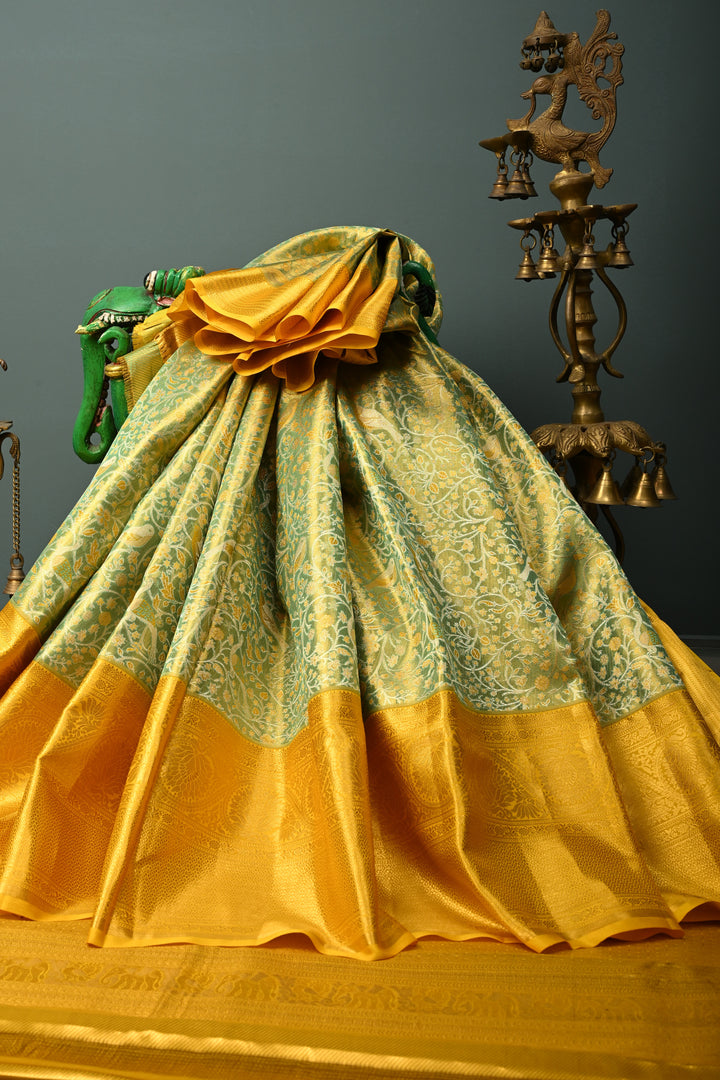 Green-Gold Pure Kanjivaram Tissue Silk Saree with Meenakari Birds-Floral Brocade Jaal and Contrast Zari Border | SILK MARK CERTIFIED | SHOBITAM