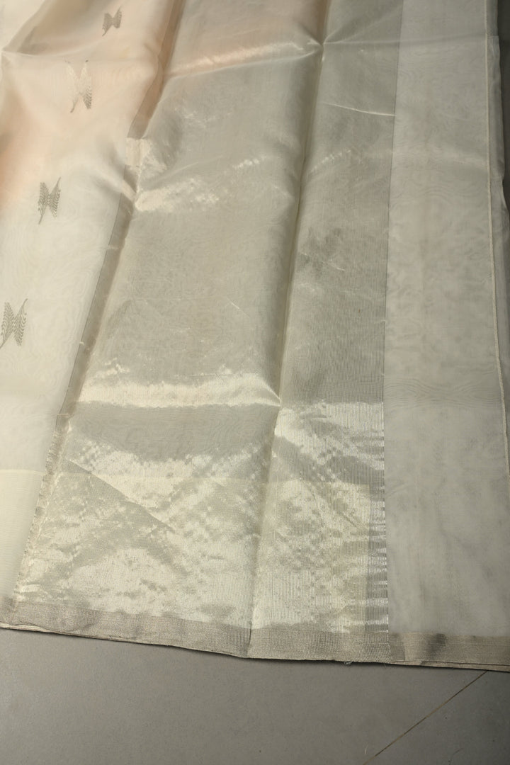 White Chanderi Silk Saree with Floral Silver Zari Buttas and Minimal Tissue Zari Border | SHOBITAM