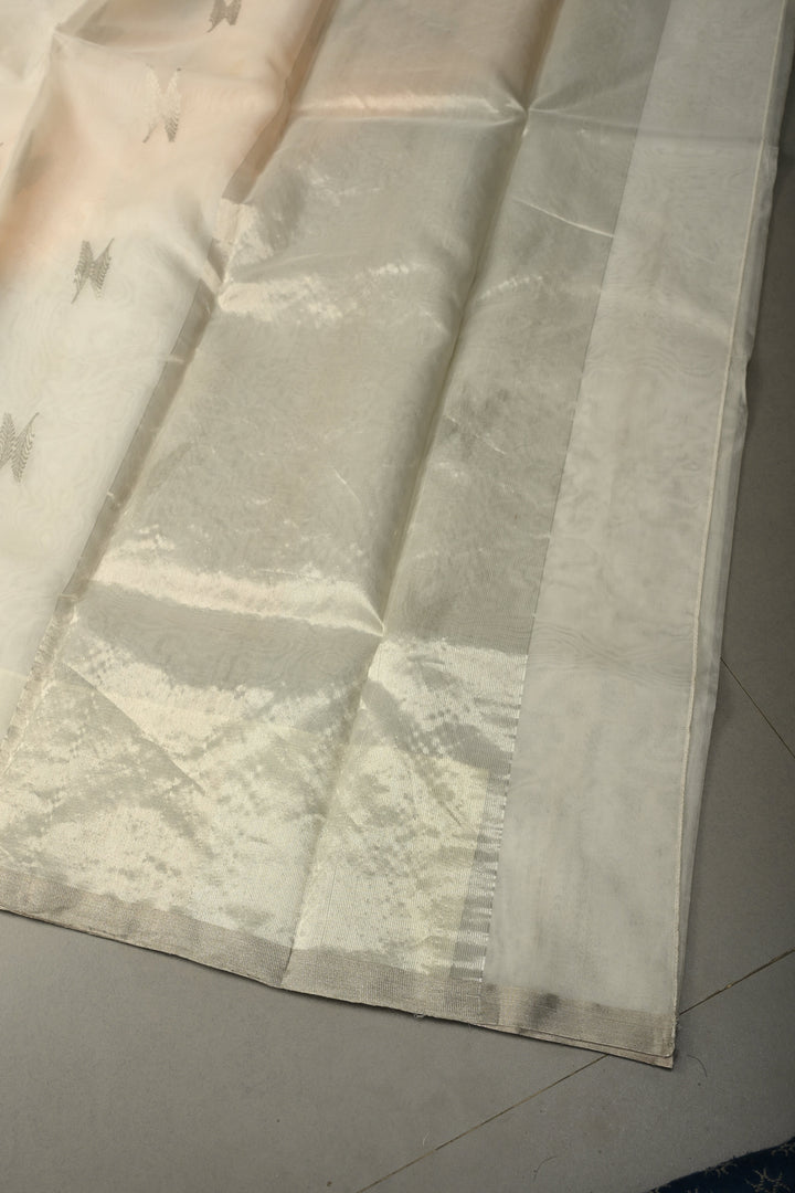 White Chanderi Silk Saree with Floral Silver Zari Buttas and Minimal Tissue Zari Border | SHOBITAM