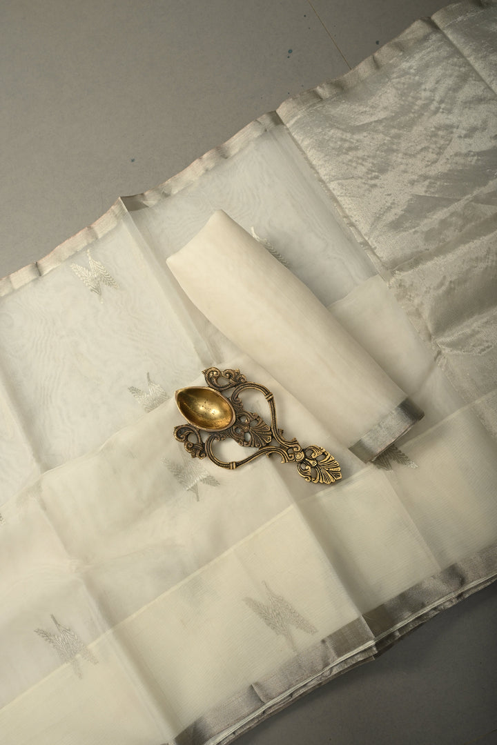 White Chanderi Silk Saree with Floral Silver Zari Buttas and Minimal Tissue Zari Border | SHOBITAM