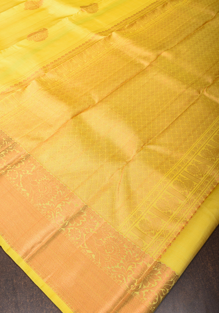Exquisite Yellow Kanjivaram Silk Saree with Paisley Motifs and Zari Border | SILK MARK CERTIFIED