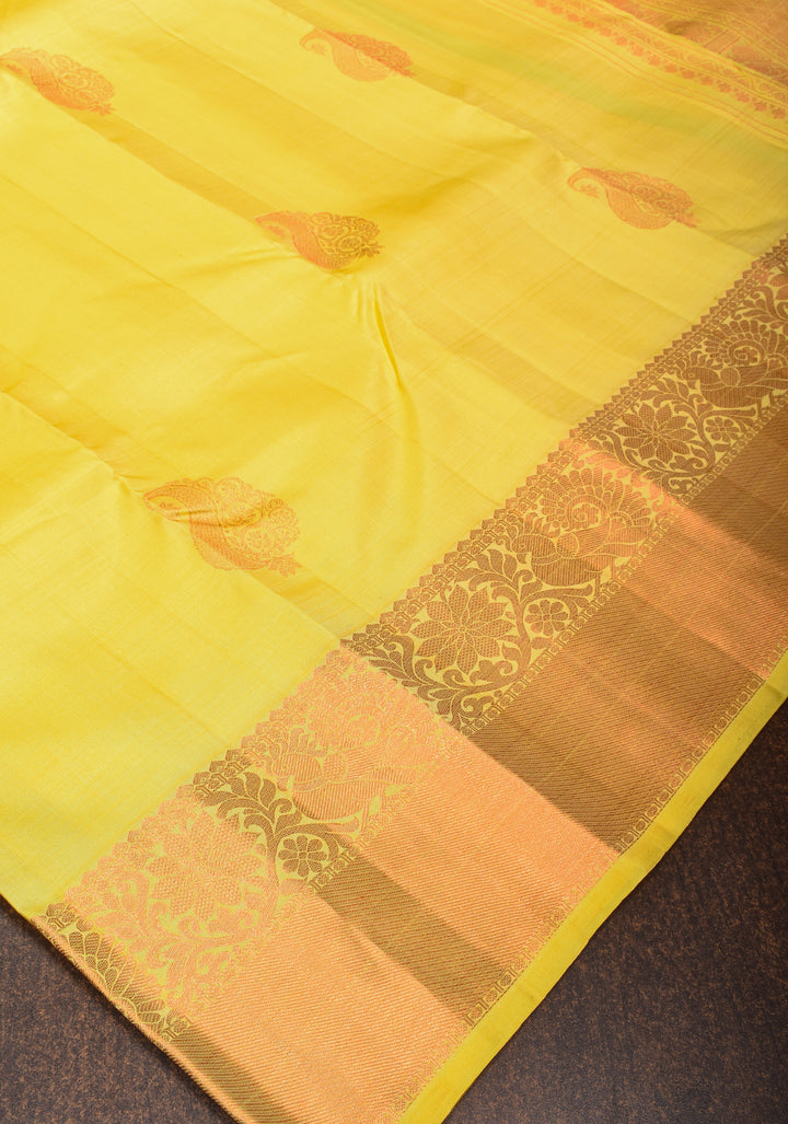 Exquisite Yellow Kanjivaram Silk Saree with Paisley Motifs and Zari Border | SILK MARK CERTIFIED