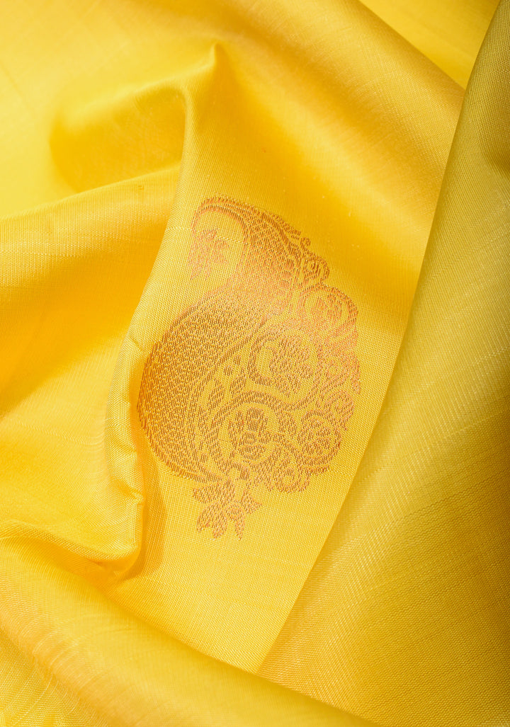 Exquisite Yellow Kanjivaram Silk Saree with Paisley Motifs and Zari Border | SILK MARK CERTIFIED