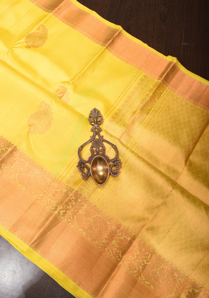 Exquisite Yellow Kanjivaram Silk Saree with Paisley Motifs and Zari Border | SILK MARK CERTIFIED