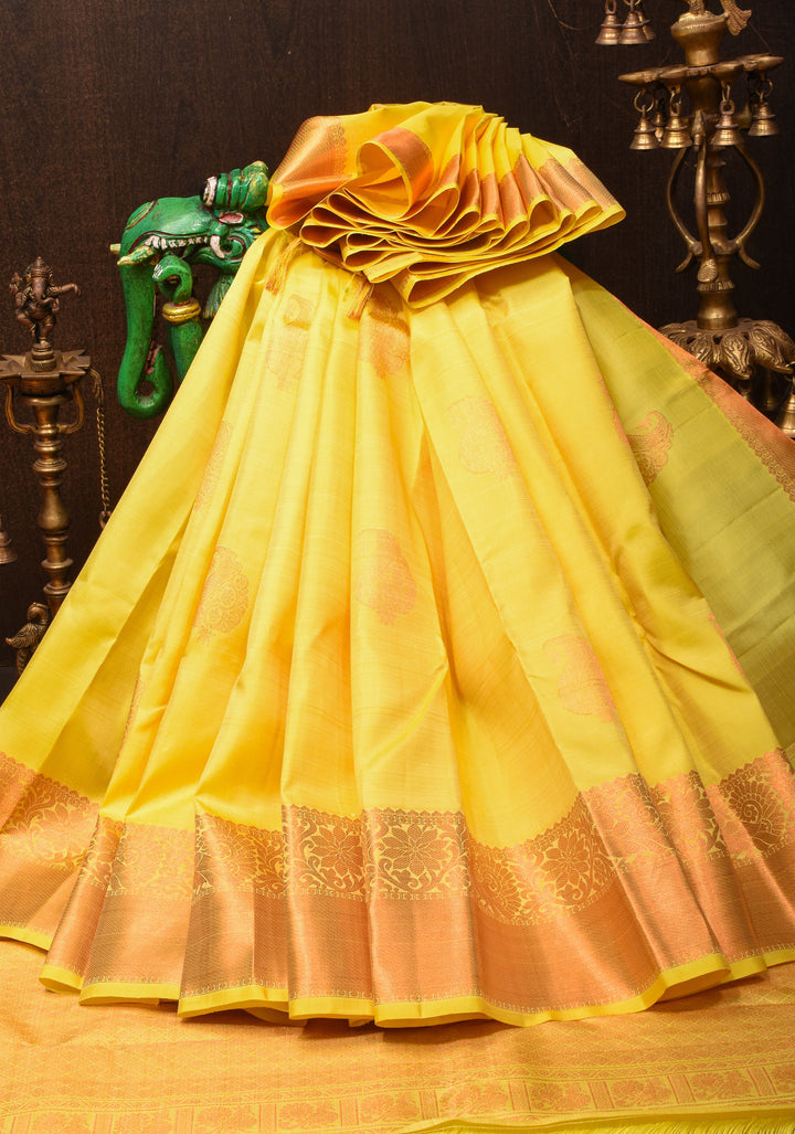 Exquisite Yellow Kanjivaram Silk Saree with Paisley Motifs and Zari Border | SILK MARK CERTIFIED