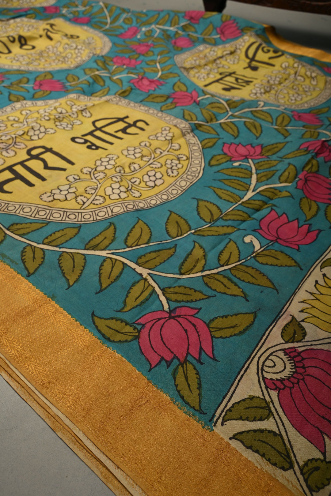 Nari Shakti Theme : Turquoise Authentic Pen kalamkari on Bangalore Silk Saree with Floral Jaal and Zari Border | SHOBITAM
