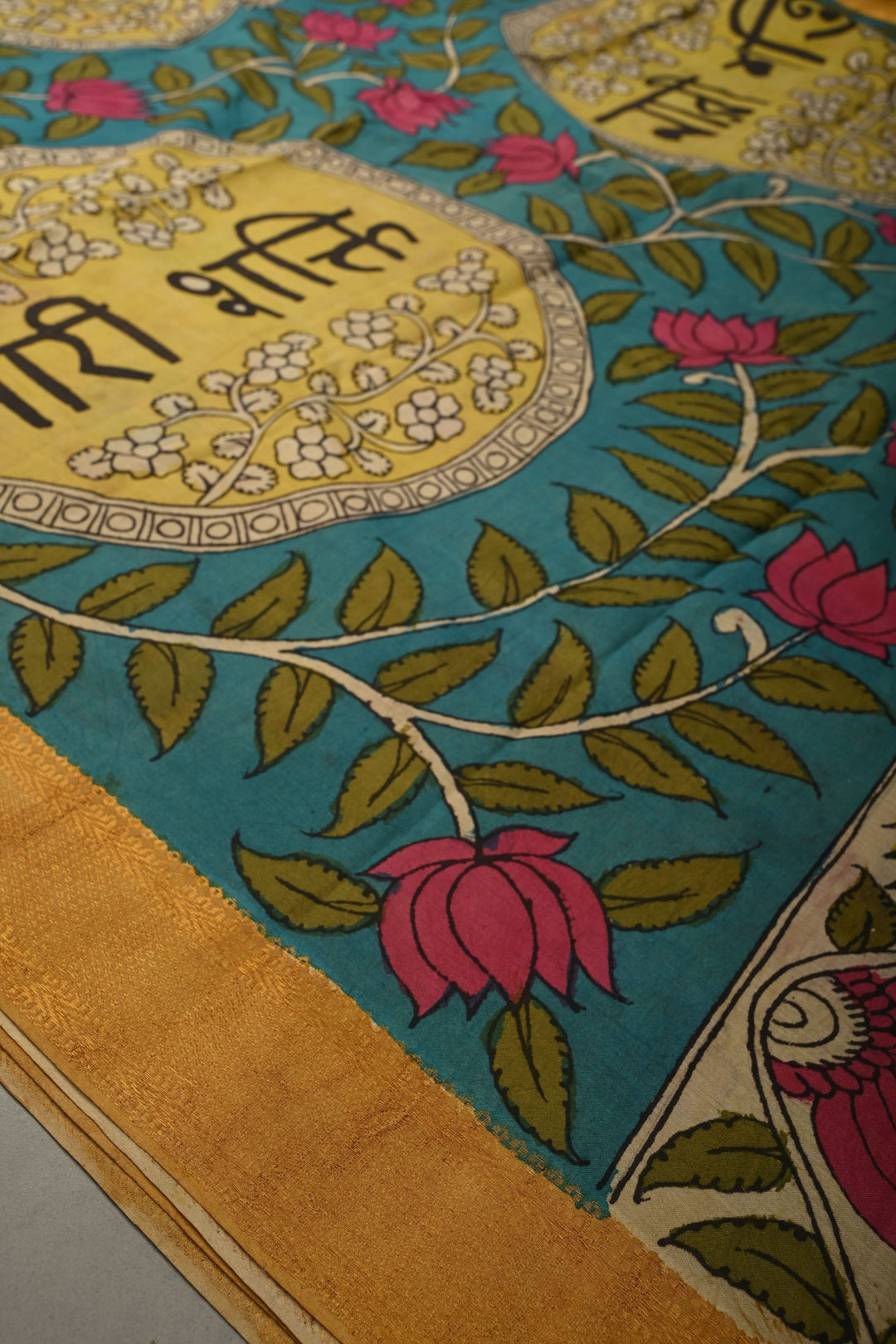 Nari Shakti Theme : Turquoise Authentic Pen kalamkari on Bangalore Silk Saree with Floral Jaal and Zari Border | SHOBITAM