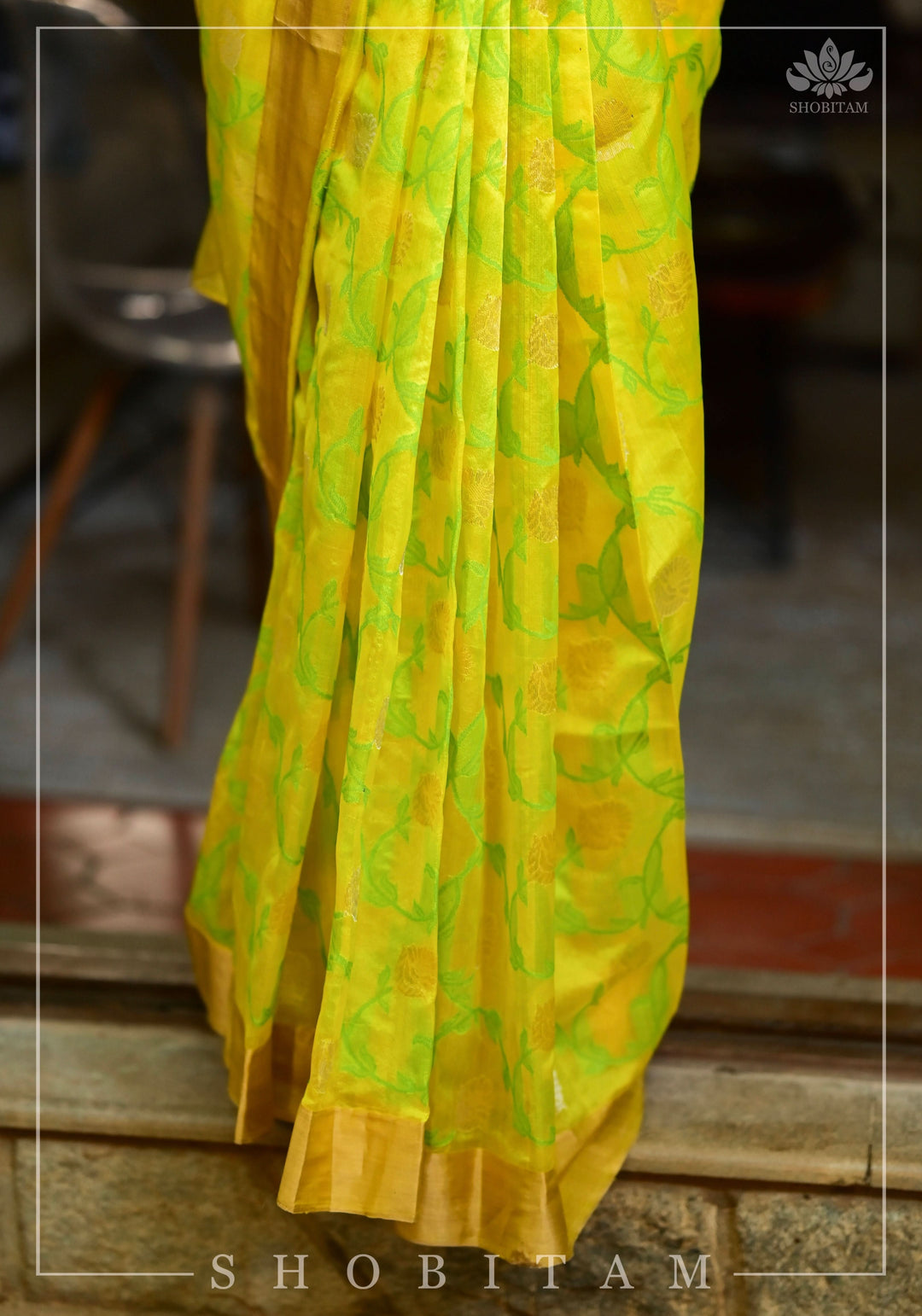 Chanderi Silk Handwoven Saree in yellow with Green all over floral Jaal and Tissue border | SHOBITAM