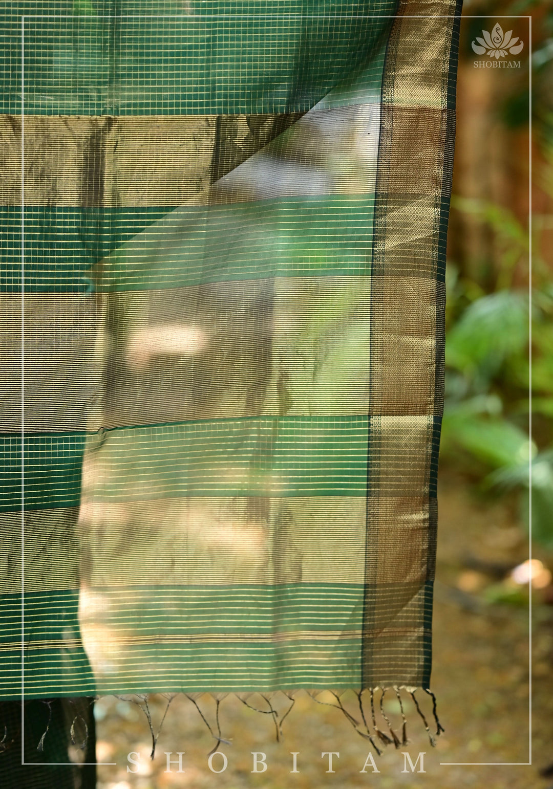 Bottle Green Handwoven Maheshwari Silk Cotton Zari Pinstripes Saree.