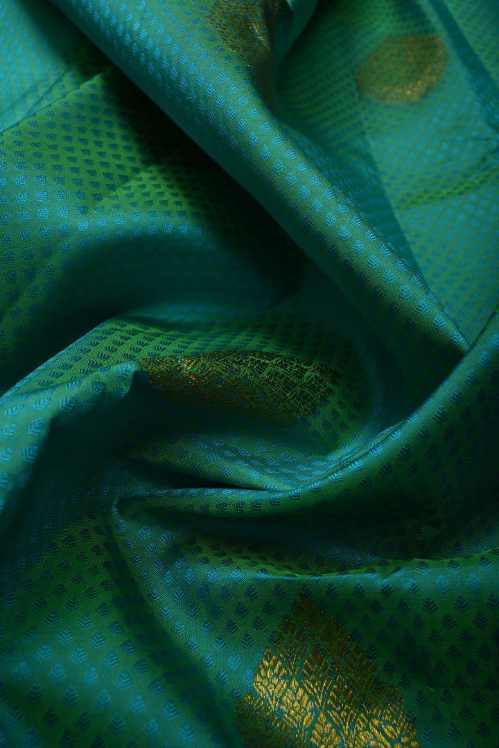 Teal Green Self Brocade on Pure Kanjivaram Silk Handloom Saree with Leaf Motifs and Zari Border | SILK MARK CERTIFIED | SHOBITAM