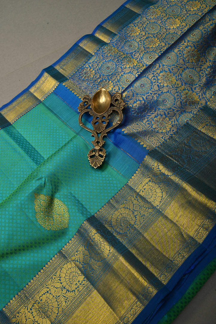 Teal Green Self Brocade on Pure Kanjivaram Silk Handloom Saree with Leaf Motifs and Zari Border | SILK MARK CERTIFIED | SHOBITAM
