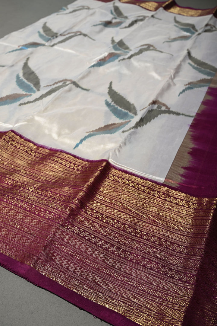 Ivory Ikkat Kanjivaram Fusion Silk Saree with Birds Buttas and Contrast Zari Border | SILK MARK CERTIFIED | SHOBITAM