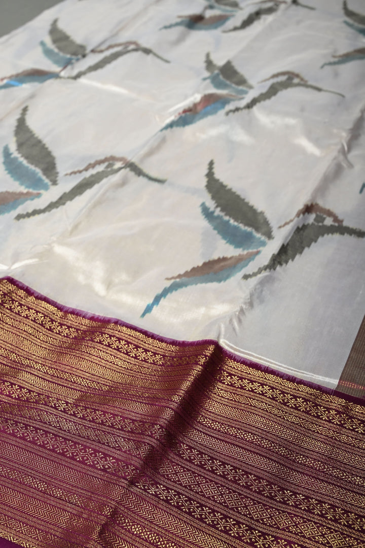 Ivory Ikkat Kanjivaram Fusion Silk Saree with Birds Buttas and Contrast Zari Border | SILK MARK CERTIFIED | SHOBITAM