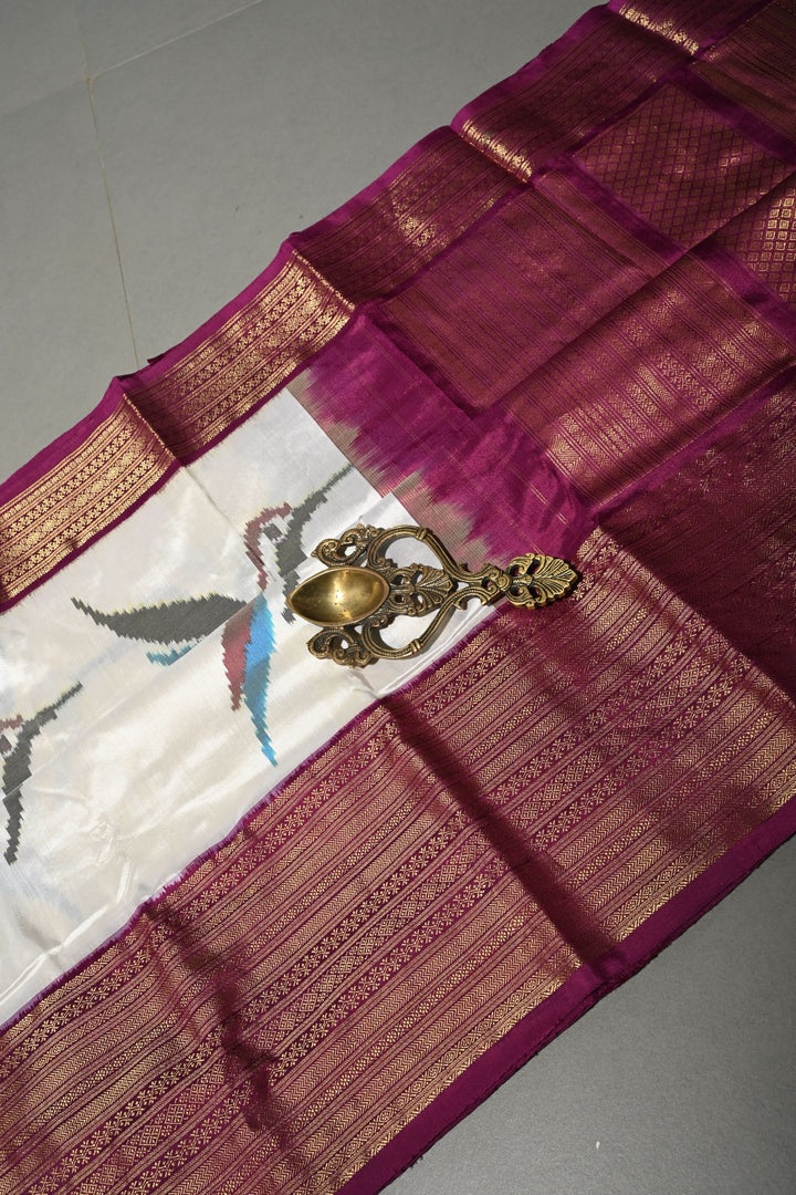 Ivory Ikkat Kanjivaram Fusion Silk Saree with Birds Buttas and Contrast Zari Border | SILK MARK CERTIFIED | SHOBITAM