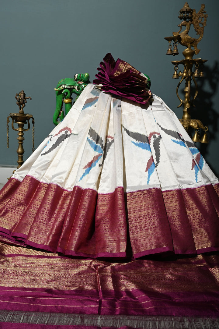 Ivory Ikkat Kanjivaram Fusion Silk Saree with Birds Buttas and Contrast Zari Border | SILK MARK CERTIFIED | SHOBITAM