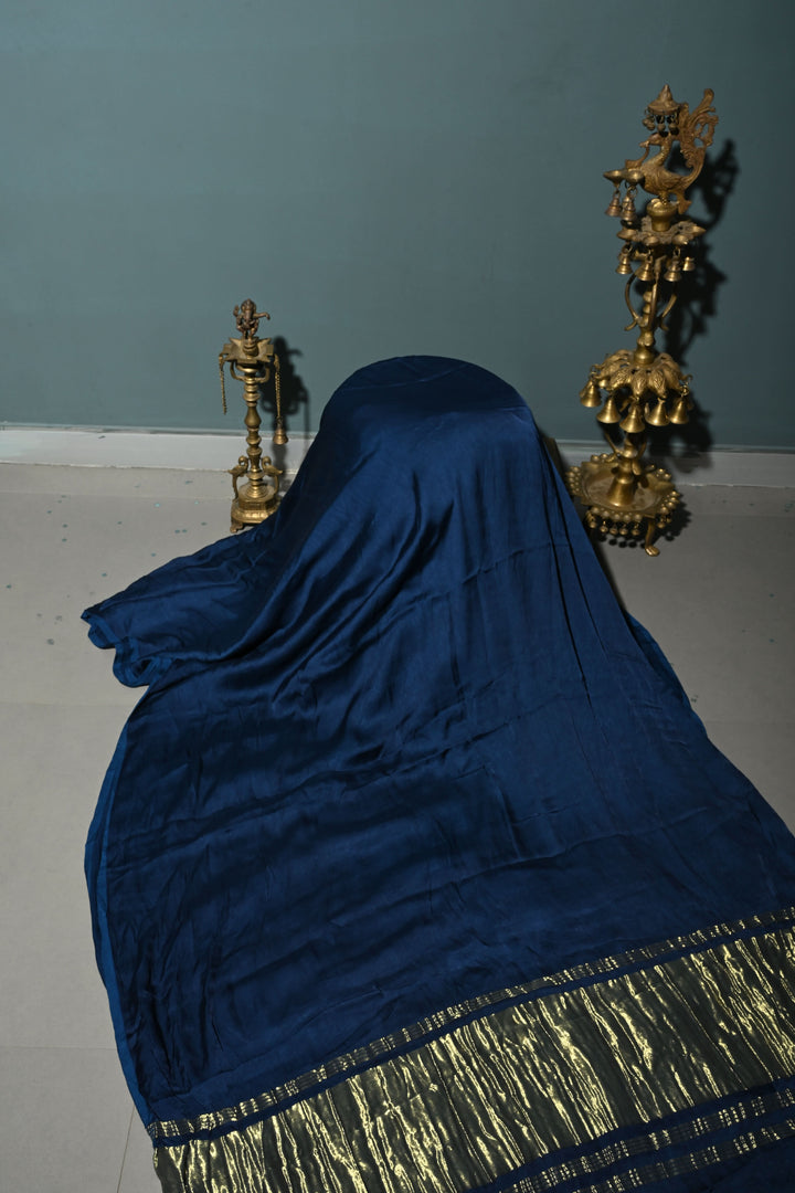 Prussian Blue Borderless Modal Silk Saree with Lagda Patta Crushed Tissue Pallu | SHOBITAM