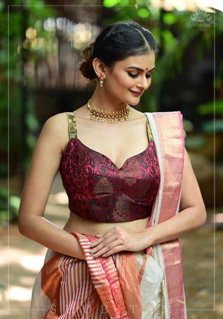Maroon Brocade Blouse with Copper Cutdana Straps and Leaf Neckline