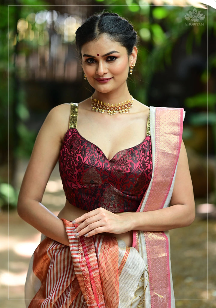 Maroon Brocade Blouse with Copper Cutdana Straps and Leaf Neckline