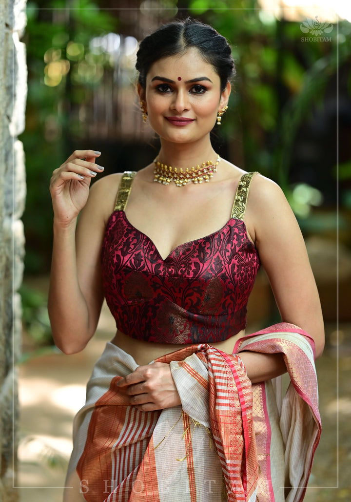 Maroon Brocade Blouse with Copper Cutdana Straps and Leaf Neckline