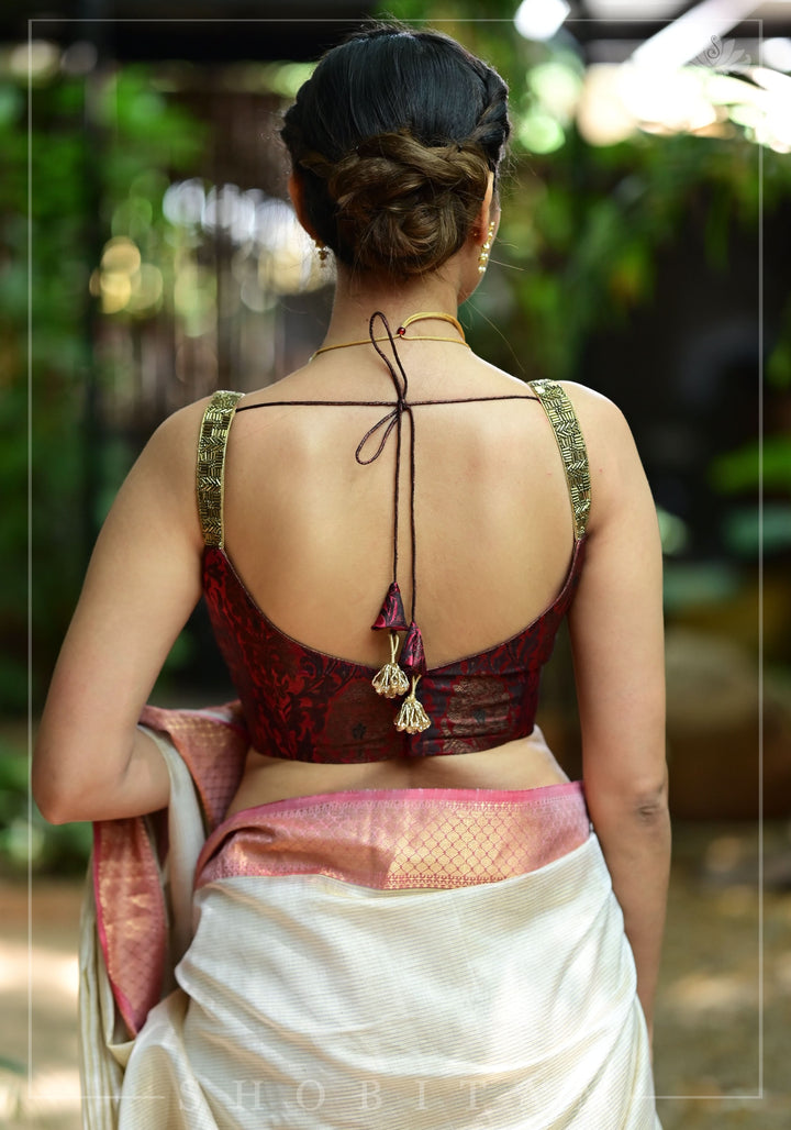 Maroon Brocade Blouse with Copper Cutdana Straps and Leaf Neckline