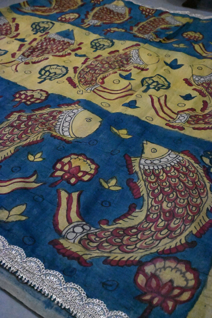 Fish Design Theme : Grayish Blue-Light Yellow Authentic Pen Kalamkari Handpainted on Pure Banarasi Tussar Silk Saree with Lace Borders | SILK MARK CERTIFIED | SHOBITAM