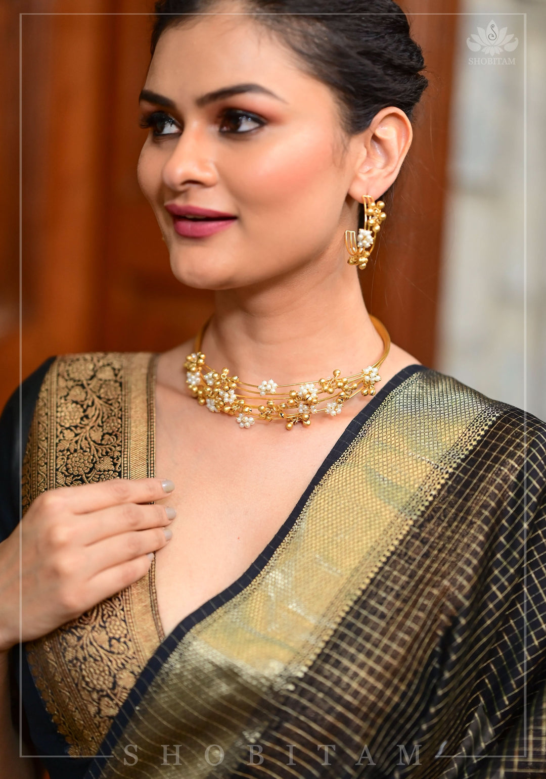 Black Blouse with Plunge Neck and Antique Tone Zari Detailing