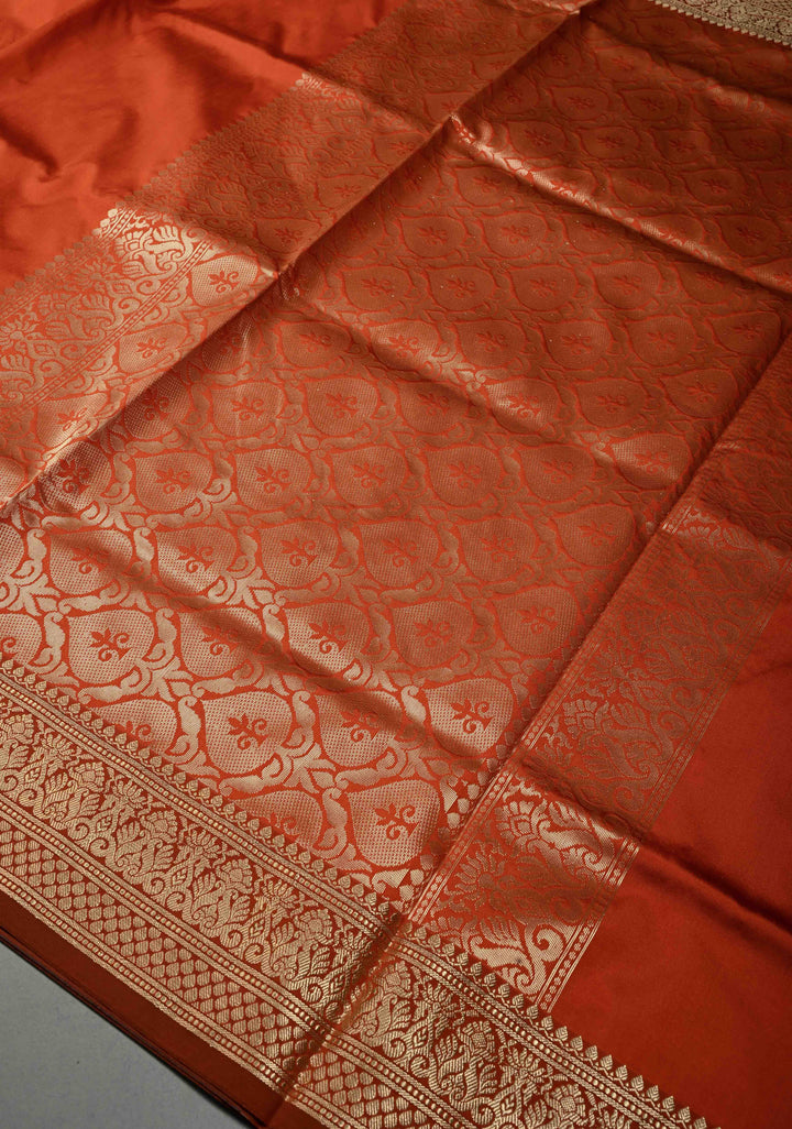 Rust Orange Semi Silk Saree with Metallic Gold Zari Border