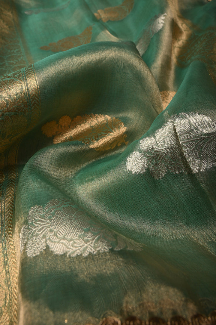 Sea Green Zari Striped On Organza Tissue Silk Saree with Sona Rupa Buttas and Fancy Lace Border | SILK MARK CERTIFIED | SHOBITAM