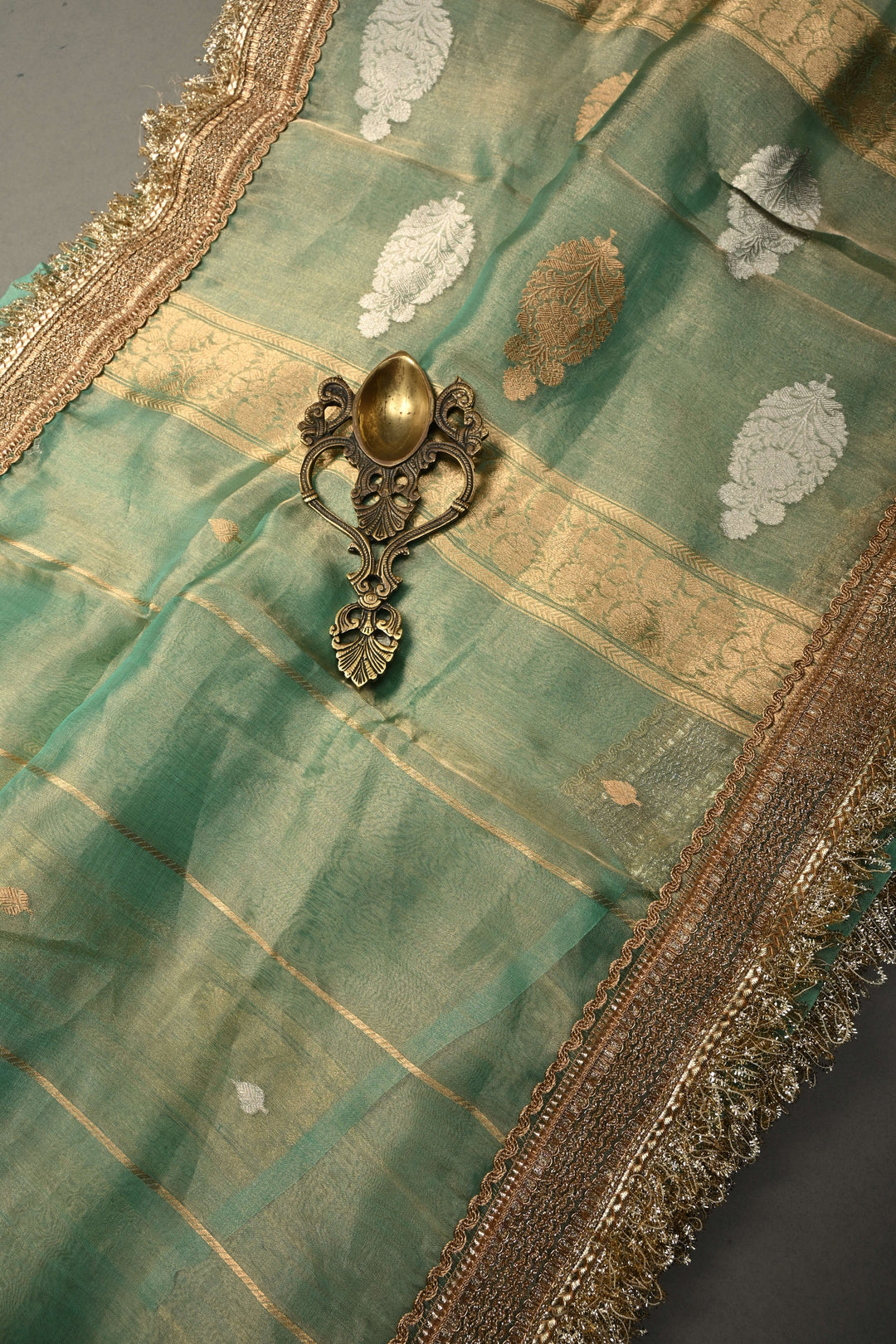 Sea Green Zari Striped On Organza Tissue Silk Saree with Sona Rupa Buttas and Fancy Lace Border | SILK MARK CERTIFIED | SHOBITAM