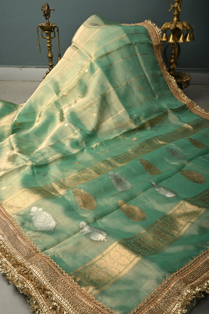 Sea Green Zari Striped On Organza Tissue Silk Saree with Sona Rupa Buttas and Fancy Lace Border | SILK MARK CERTIFIED | SHOBITAM