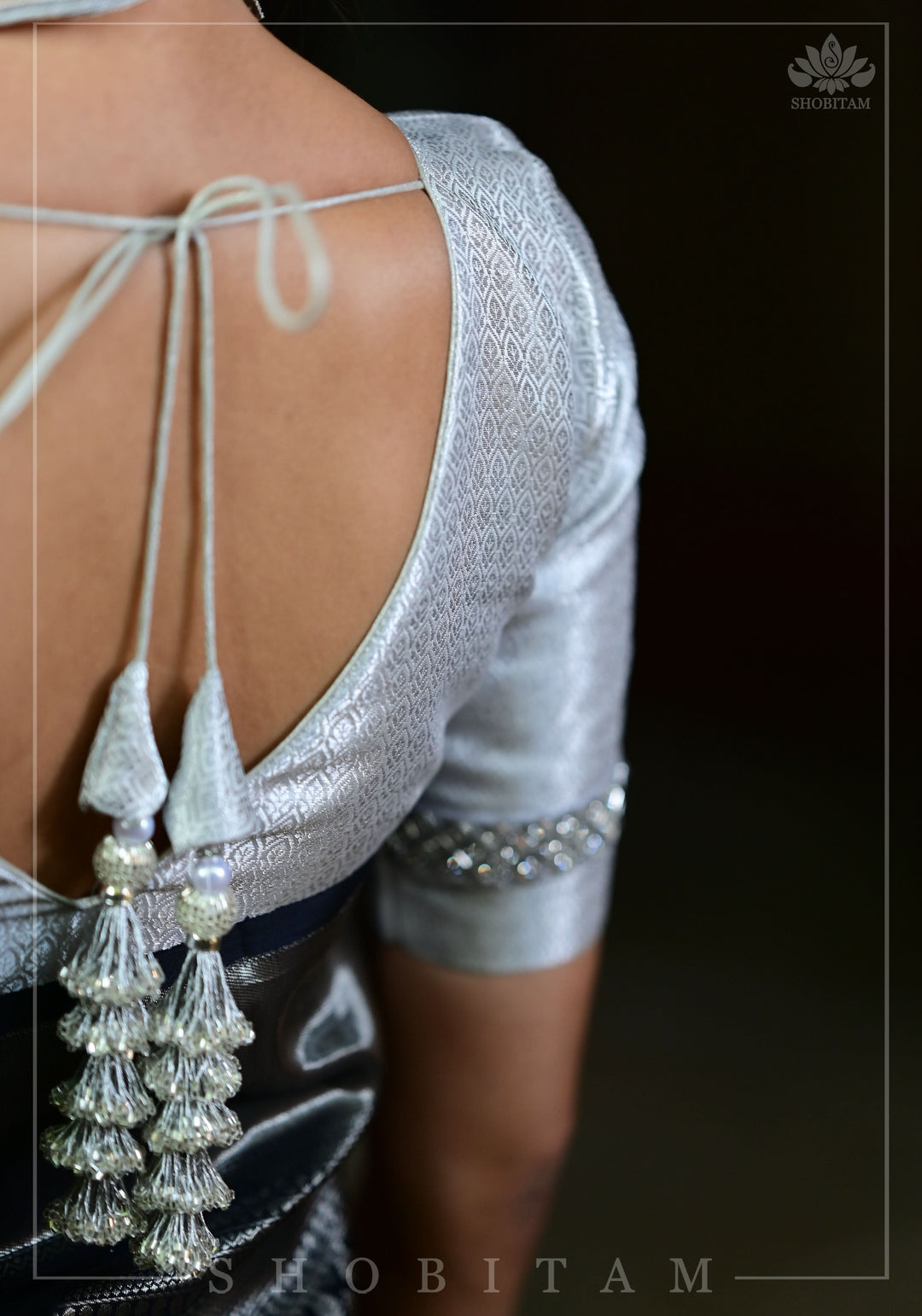 V neck Silver blouse with stonework Trim on Sleeve and cutdana tassels