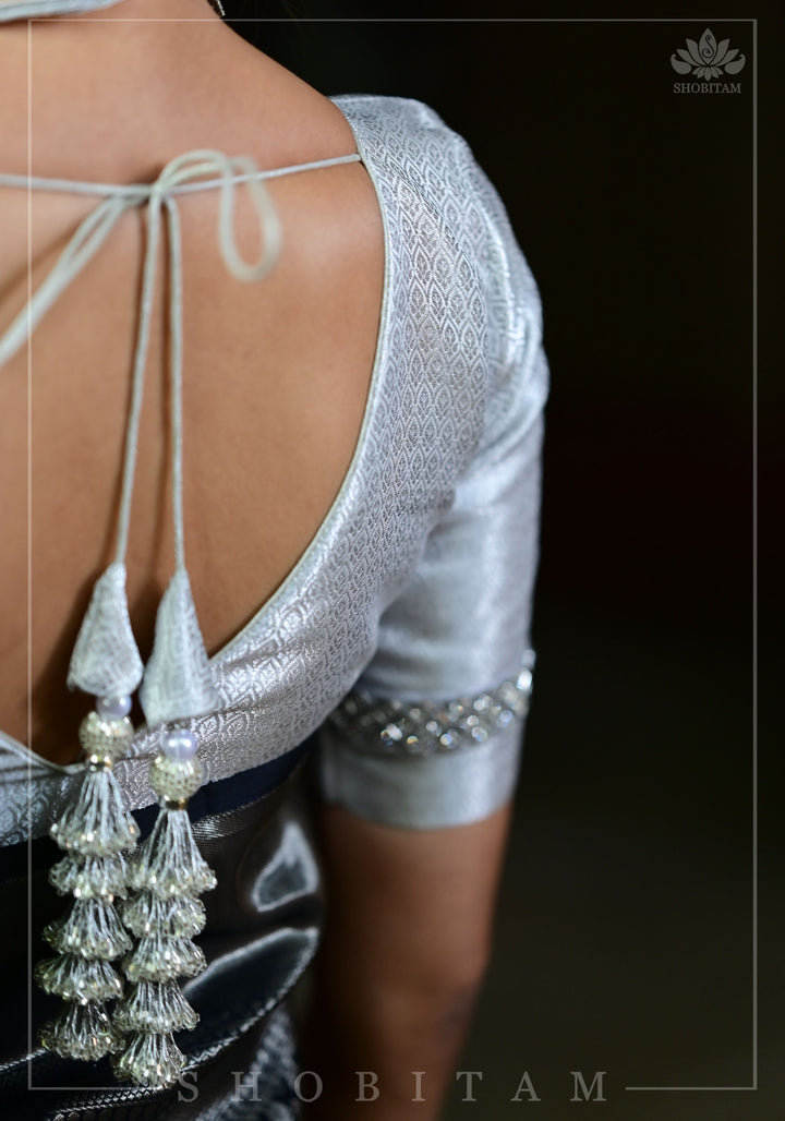 V neck Silver blouse with stonework Trim on Sleeve and cutdana tassels