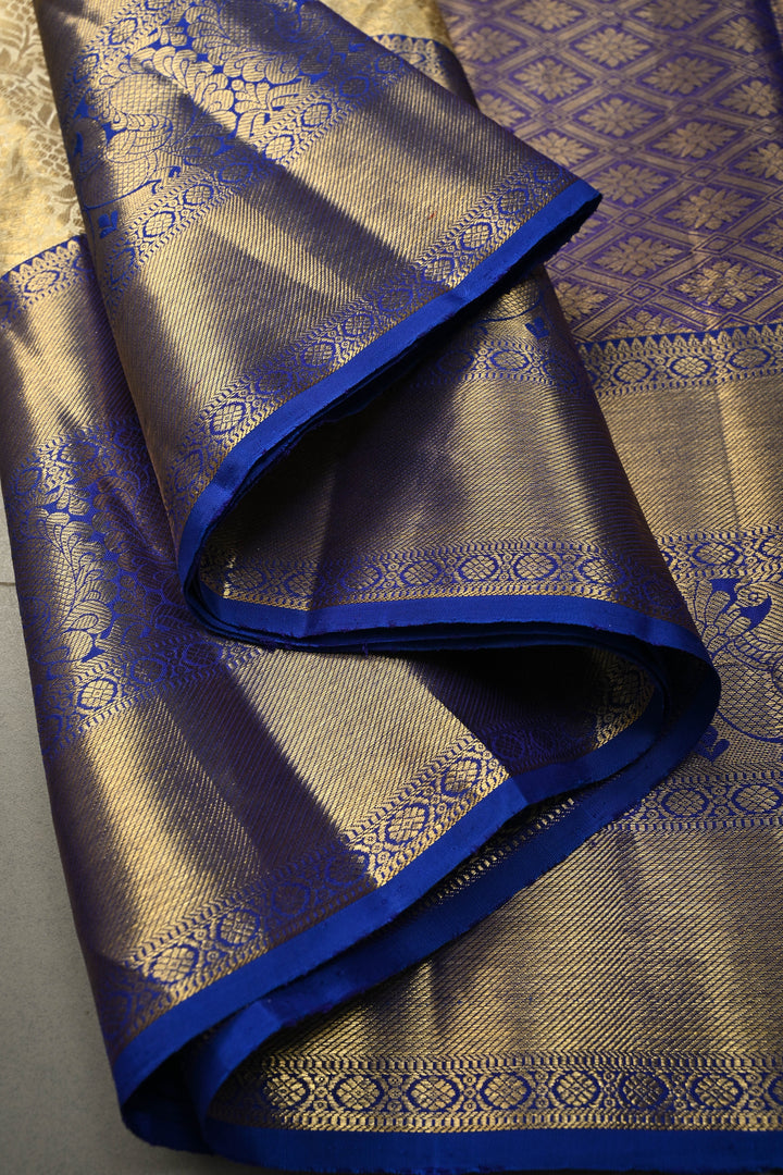 Talambralu Ivory-Gold Pure Kanjivaram Tissue Silk Saree with Floral Brocade Jaal and Contrast Zari Border | SILK MARK CERTIFIED | SHOBITAM