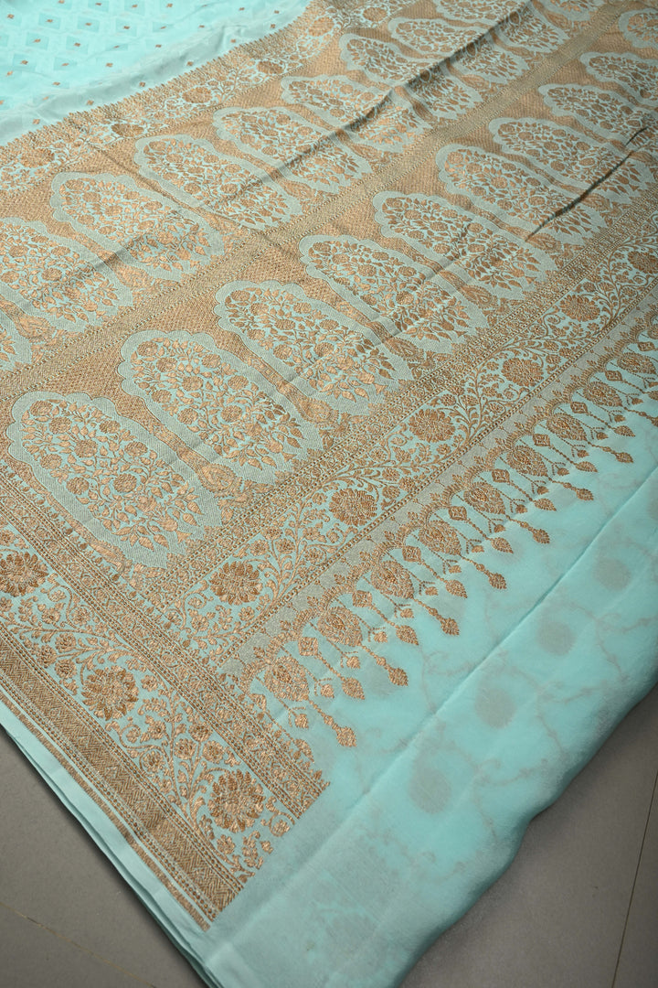 Cyan Blue Self Brocade Jaal on Banarasi Georgette Silk Saree with Antique Zari Buttis and Zari Border | SILK MARK CERTIFIED | SHOBITAM