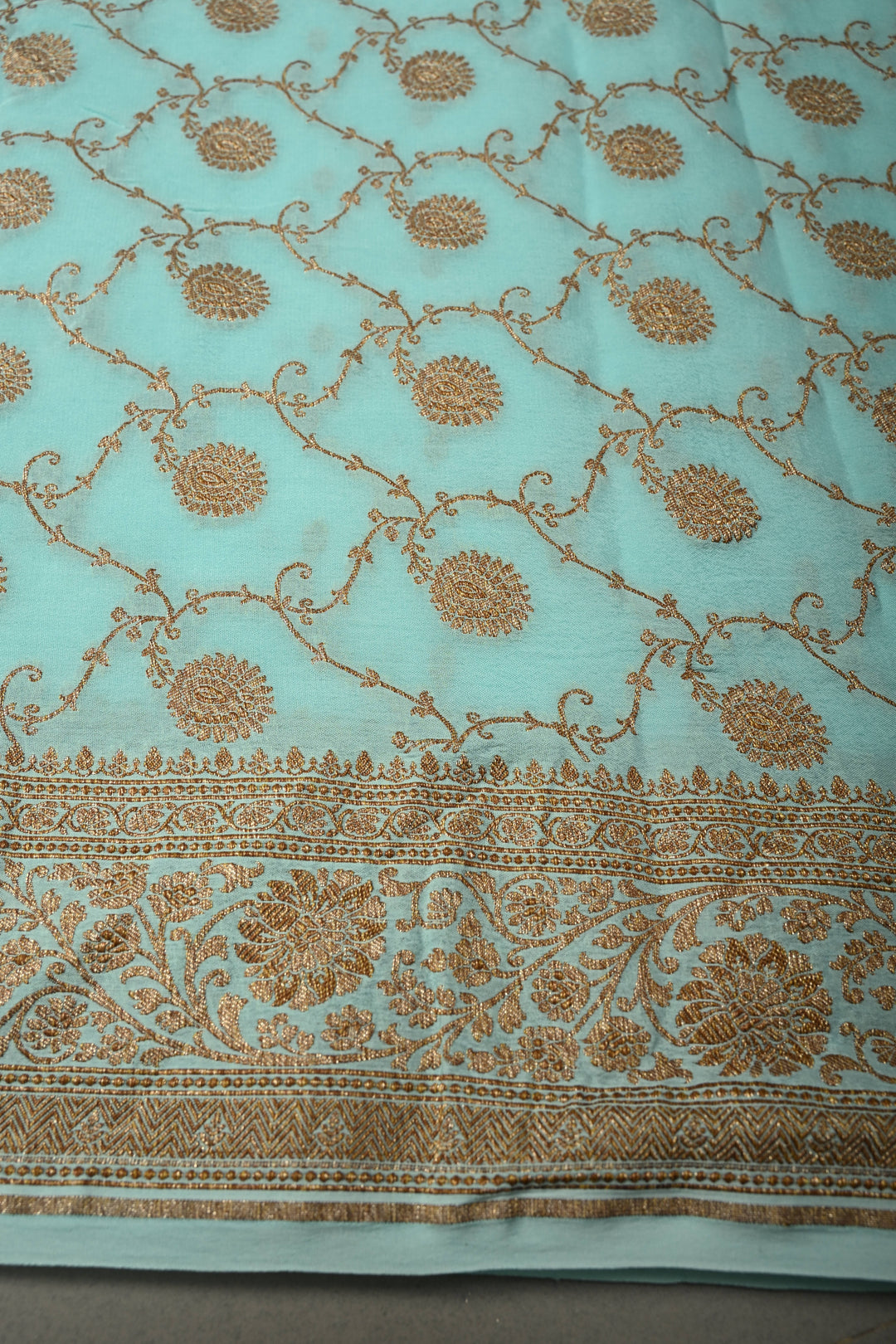 Cyan Blue Self Brocade Jaal on Banarasi Georgette Silk Saree with Antique Zari Buttis and Zari Border | SILK MARK CERTIFIED | SHOBITAM