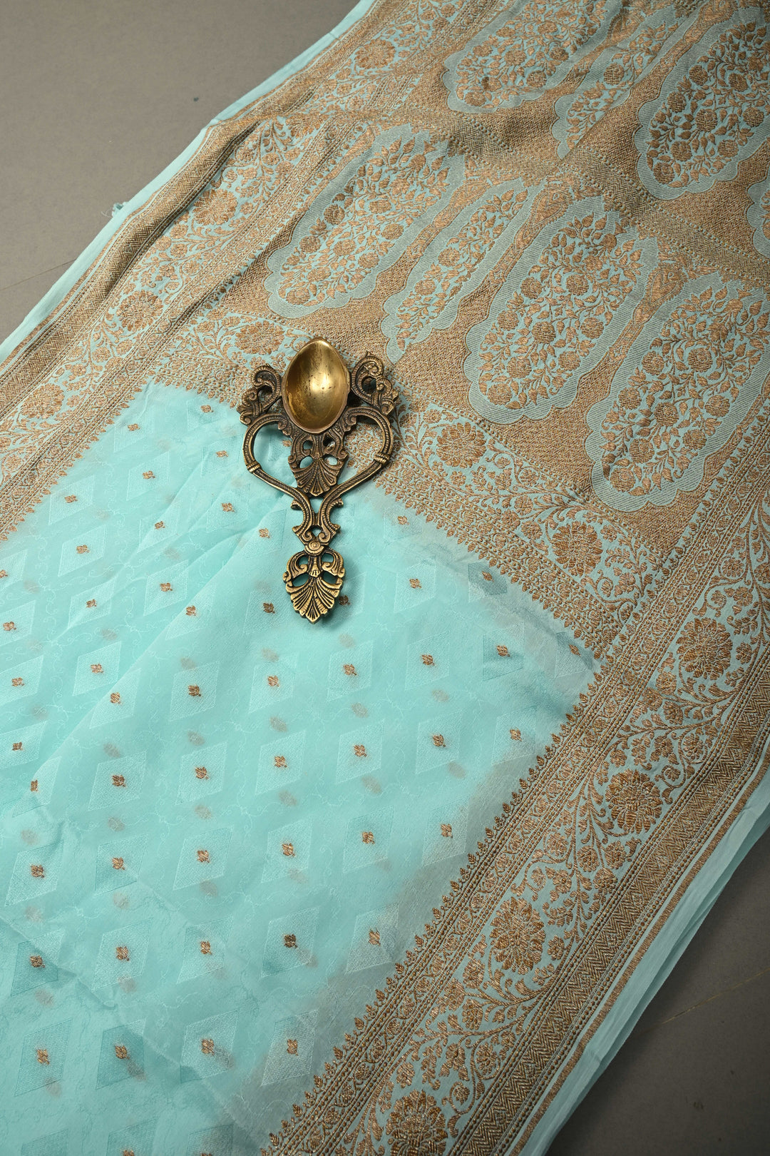 Cyan Blue Self Brocade Jaal on Banarasi Georgette Silk Saree with Antique Zari Buttis and Zari Border | SILK MARK CERTIFIED | SHOBITAM