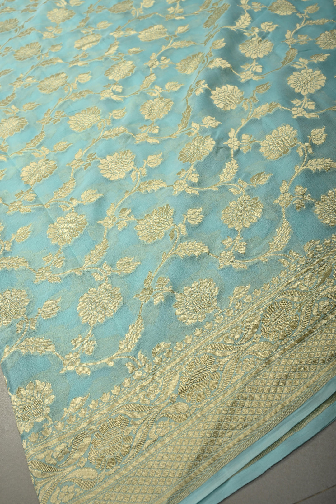Aqua Blue Banarasi Georgette Silk Saree with Floral Zari Jaal and Zari Border | SILK MARK CERTIFIED | SHOBITAM