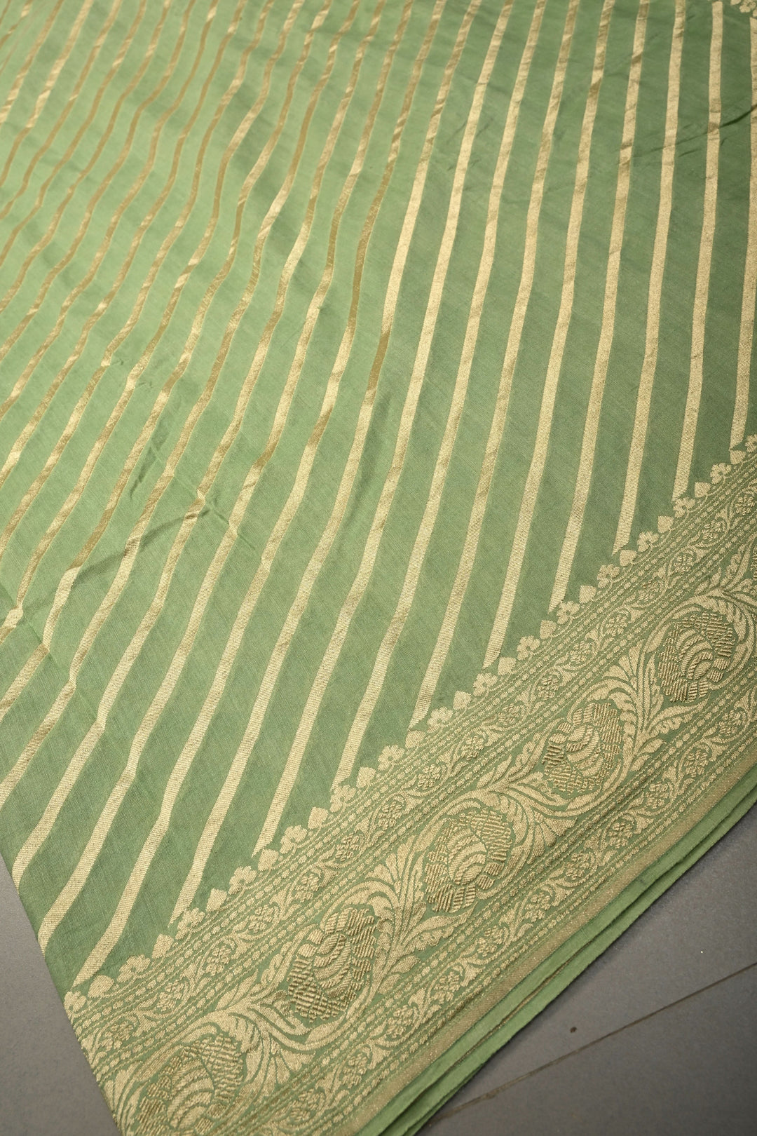 Pale Green Banarasi Georgette Silk Saree with Diagonal Stripes and Zari Border | SILK MARK CERTIFIED | SHOBITAM