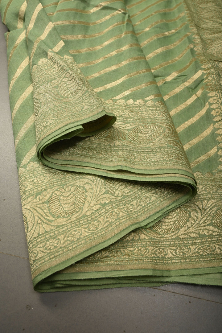 Pale Green Banarasi Georgette Silk Saree with Diagonal Stripes and Zari Border | SILK MARK CERTIFIED | SHOBITAM