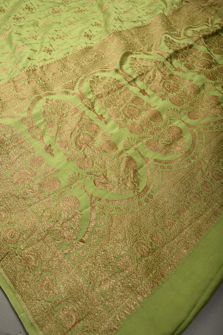 Dusty Pista Green Banarasi Crepe Georgette Silk Saree with Antique Geometric Jaal and Oxidized Zari Border | SILK MARK CERTIFIED | SHOBITAM