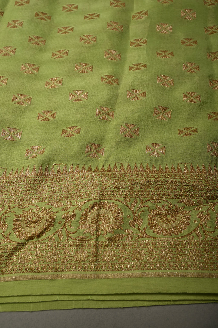 Dusty Pista Green Banarasi Crepe Georgette Silk Saree with Antique Geometric Jaal and Oxidized Zari Border | SILK MARK CERTIFIED | SHOBITAM