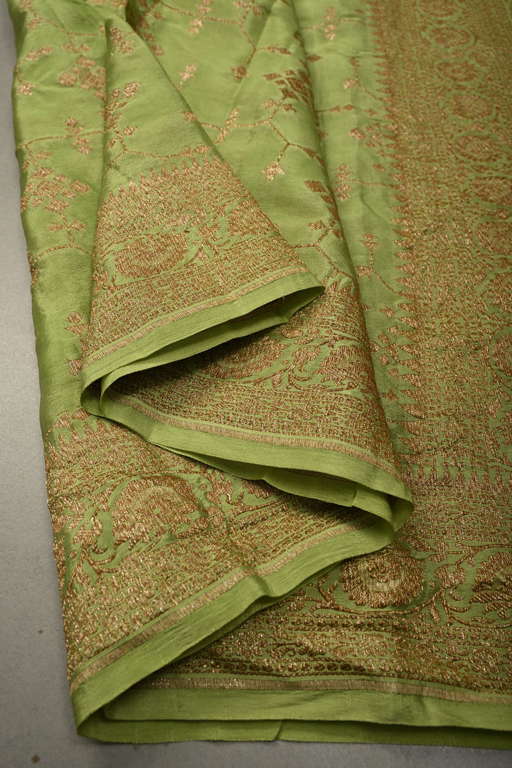 Dusty Pista Green Banarasi Crepe Georgette Silk Saree with Antique Geometric Jaal and Oxidized Zari Border | SILK MARK CERTIFIED | SHOBITAM