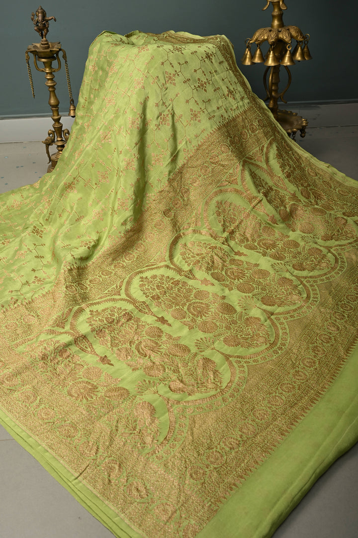 Dusty Pista Green Banarasi Crepe Georgette Silk Saree with Antique Geometric Jaal and Oxidized Zari Border | SILK MARK CERTIFIED | SHOBITAM