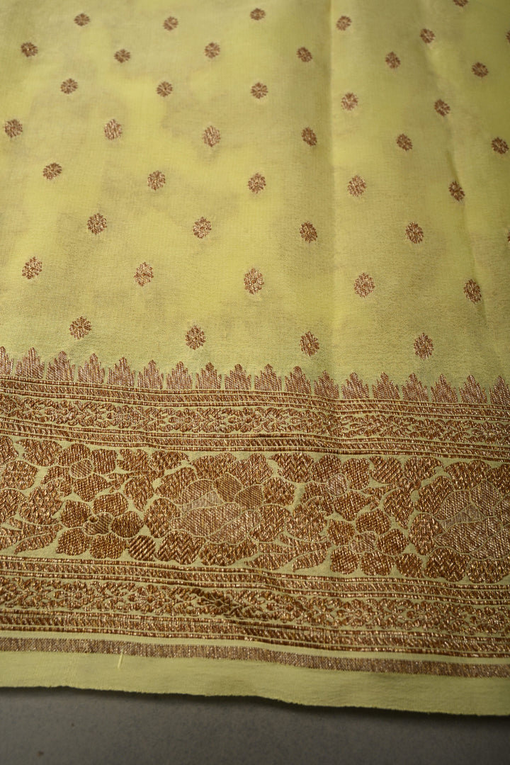 Pastel Yellow Banarasi Georgette Silk Saree with Antique Floral Jaal and Oxidized Zari Border | SILK MARK CERTIFIED | SHOBITAM