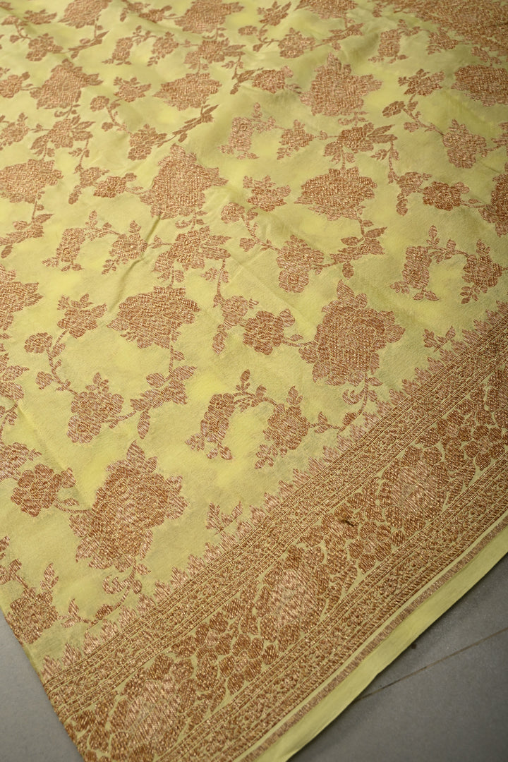 Pastel Yellow Banarasi Georgette Silk Saree with Antique Floral Jaal and Oxidized Zari Border | SILK MARK CERTIFIED | SHOBITAM