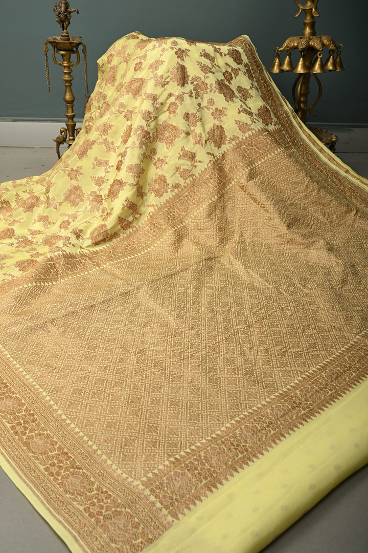 Pastel Yellow Banarasi Georgette Silk Saree with Antique Floral Jaal and Oxidized Zari Border | SILK MARK CERTIFIED | SHOBITAM