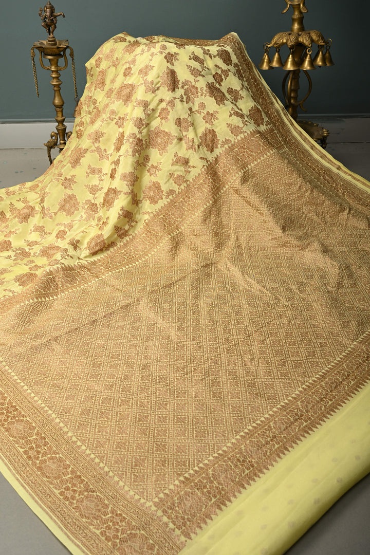 Pastel Yellow Banarasi Georgette Silk Saree with Antique Floral Jaal and Oxidized Zari Border | SILK MARK CERTIFIED | SHOBITAM