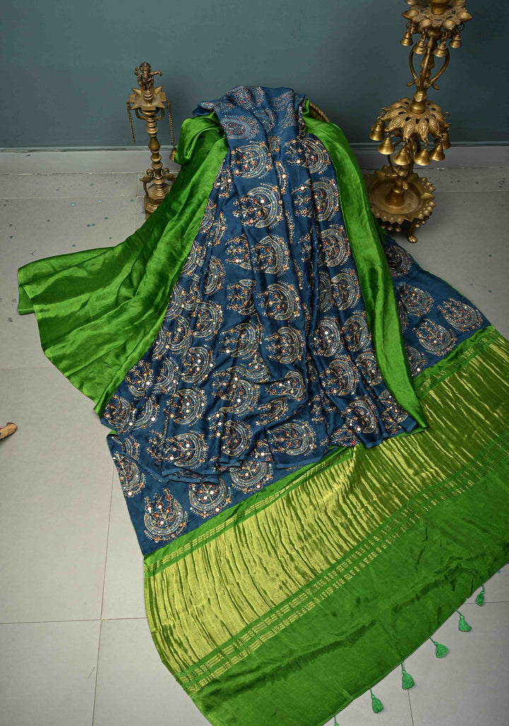Sap Green-Indigo Block Print Half and Half Modal Silk Saree with Cutdana, Sequins, Mirror Hand Work and Lagda Patta Tissue Pallu | SHOBITAM